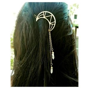 Handmade golden moon phase hair jewelry with white howlite stones.